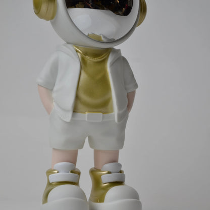 Cosmic Gold Voyager astronaut figurine with gold visor and white outfit