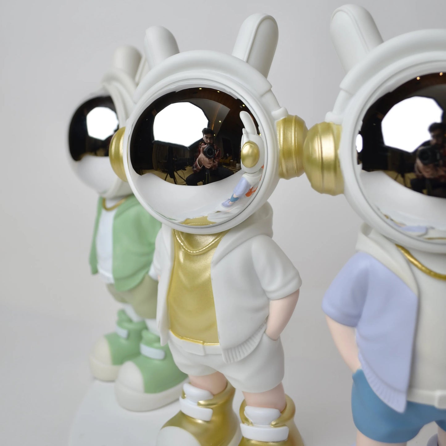 Cosmic Gold Voyager astronaut figurine with gold visor and white outfit