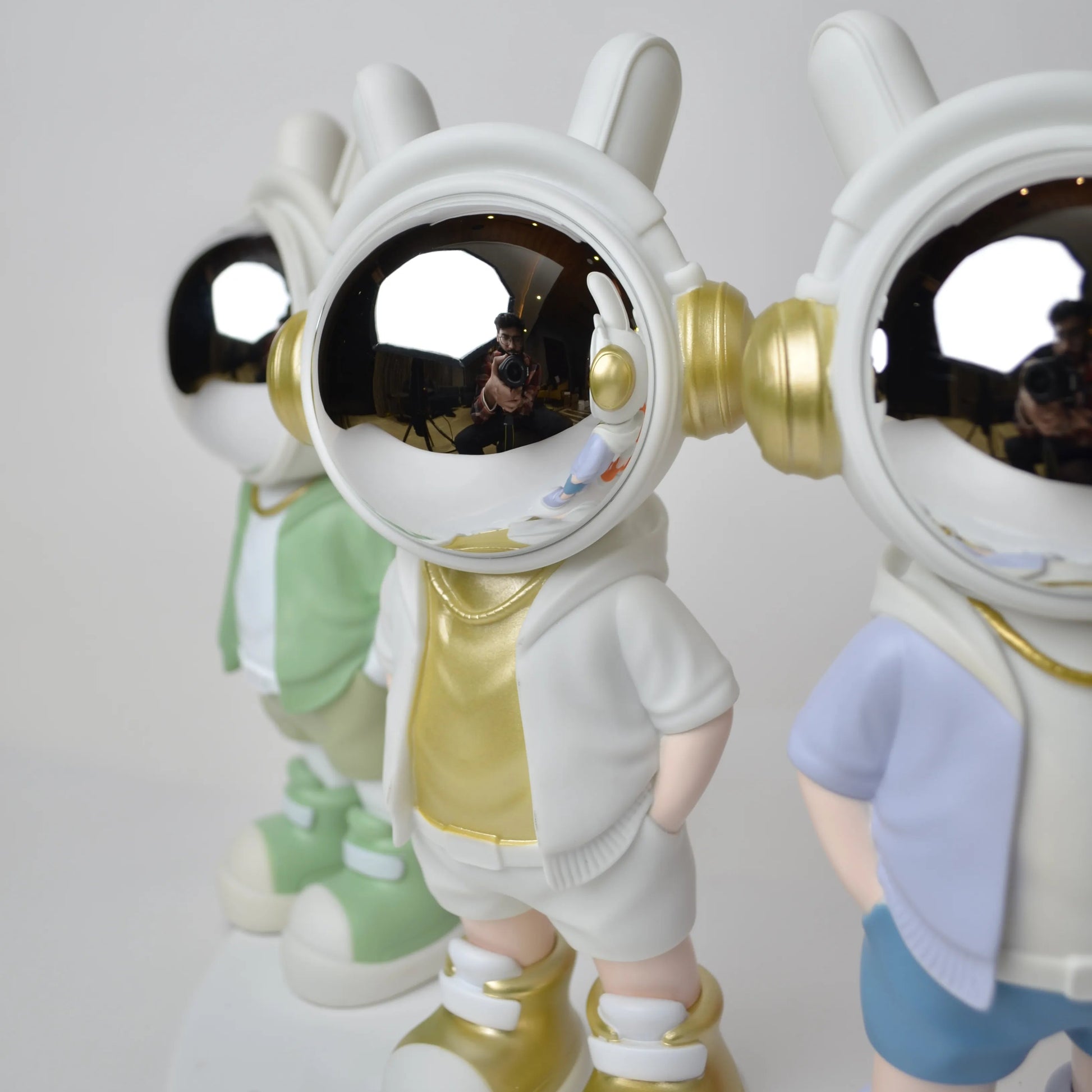 Cosmic Gold Voyager astronaut figurine with gold visor and white outfit