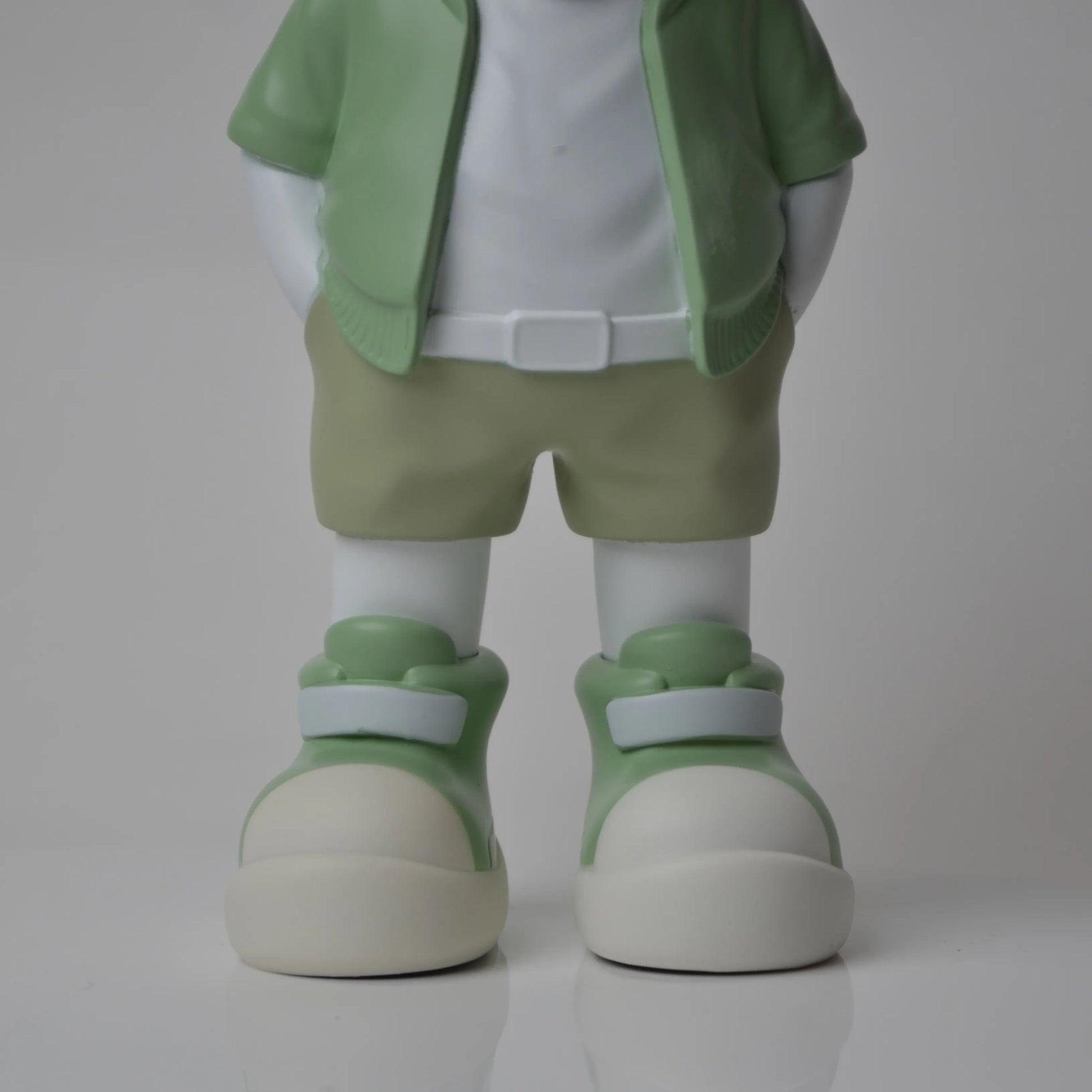 Cosmic Mint Voyager astronaut figurine with mint jacket and chrome visor.