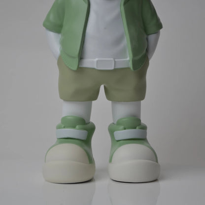 Cosmic Mint Voyager astronaut figurine with mint jacket and chrome visor.