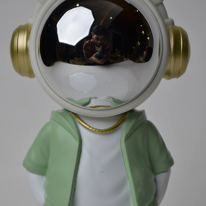 Cosmic Mint Voyager astronaut figurine with mint jacket and chrome visor.