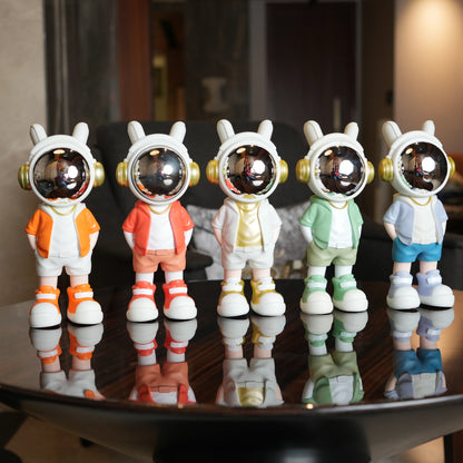 Cosmic Mint Voyager astronaut figurine with mint jacket and chrome visor.