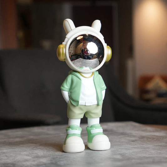 Cosmic Mint Voyager astronaut figurine with mint jacket and chrome visor.