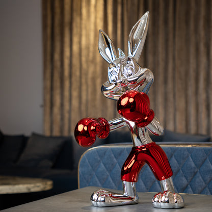 Resin bunny boxer figurine with chrome black finish and scarlet red gloves and shorts