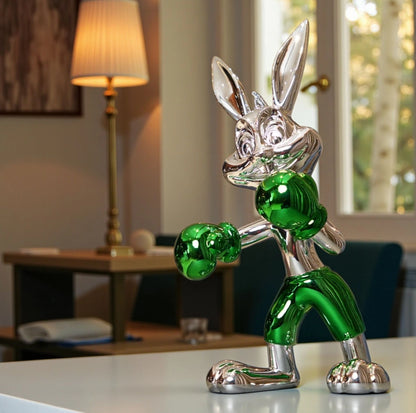 Resin bunny boxer figurine with chrome silver finish and emerald green gloves and shorts