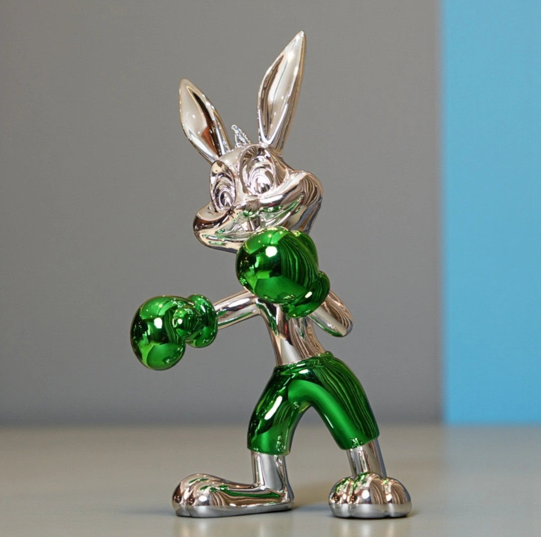 Resin bunny boxer figurine with chrome silver finish and emerald green gloves and shorts