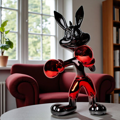 Resin bunny boxer figurine with chrome silver finish and crimson red gloves and shorts