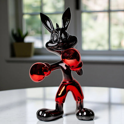 Resin bunny boxer figurine with chrome silver finish and crimson red gloves and shorts