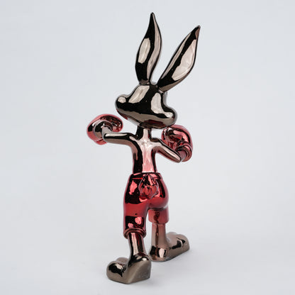 Resin bunny boxer figurine with chrome silver finish and crimson red gloves and shorts