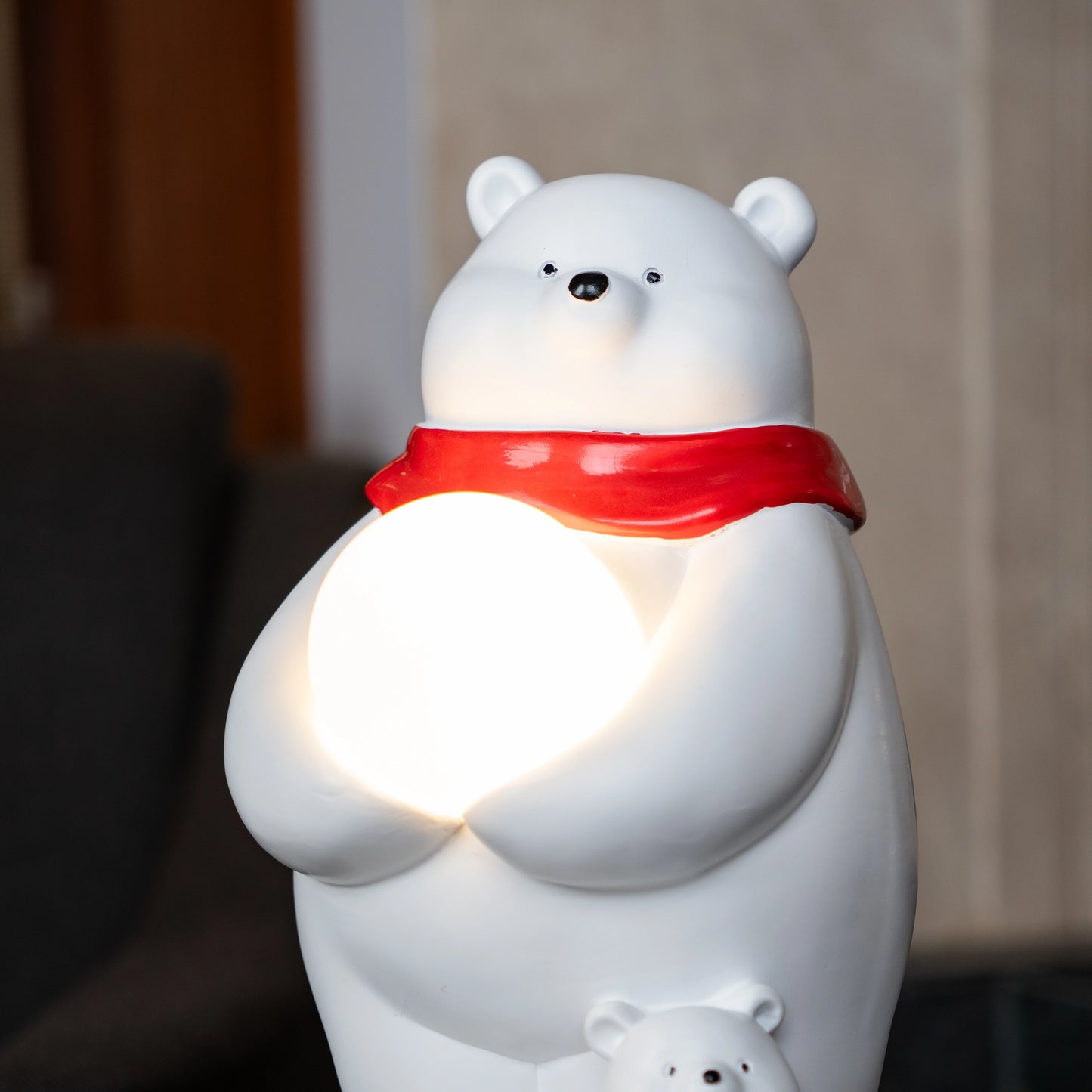 White ceramic polar-bear lamp with glowing orb and cub — Polar Glow Lamp by Ghar Art, handcrafted modern home-decor lighting for cozy and luxury interiors.