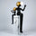 Black and gold human figurine duo holding a glowing orb on a marble pedestal sculpture