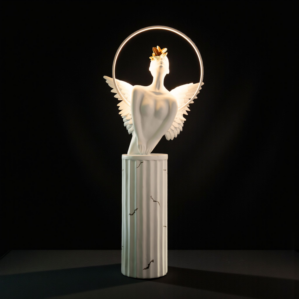 White angelic sculpture with wings, gold crown, and LED halo on marble-style base — Heavenly Wing Sculpture by Ghar Art, handcrafted luxury home decor accent symbolizing peace and divinity.