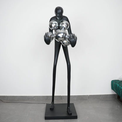Glow figure lamp, chrome globes, showroom