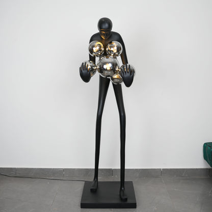 Glow figure lamp, chrome orbs, front shot