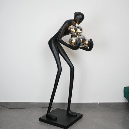 Glow figure lamp, smoked globes, side angle
