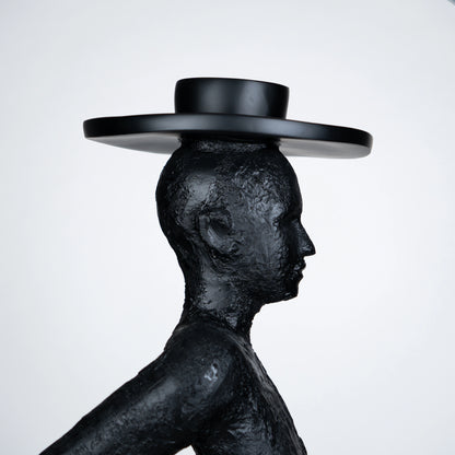 Tall black resin luminous poise sculpture with glowing LED halo — The Illuminated Voyager Sculpture by Ghar Art, handcrafted luxury home decor, 190 cm tall statement art piece.