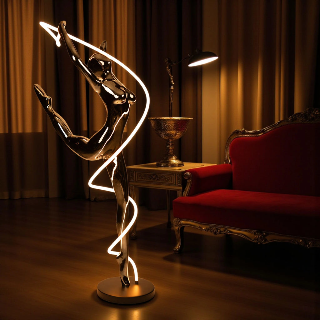 Metallic black human spiral floor sculpture with integrated LED light