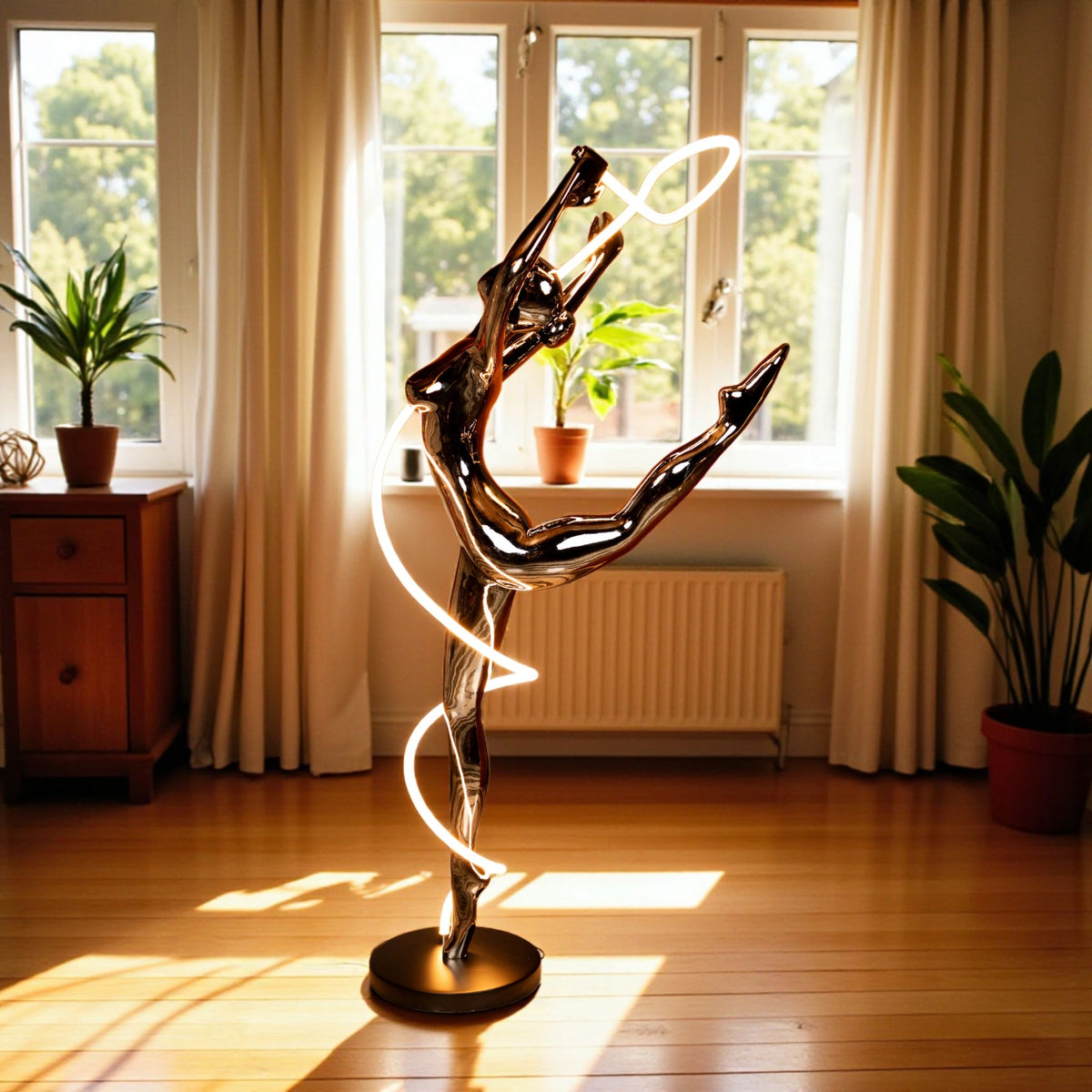 Metallic black human spiral floor sculpture with integrated LED light
