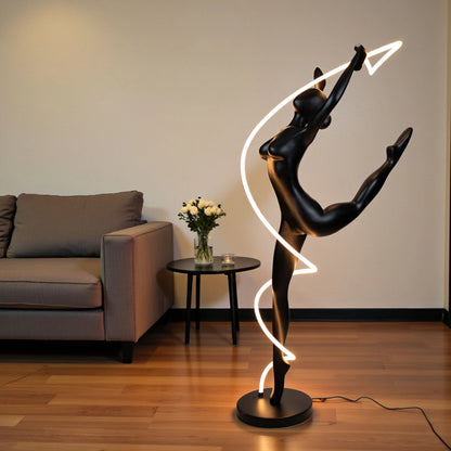 Matte black human figure sculpture with glowing spiral LED light