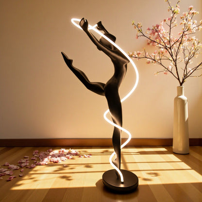 Matte black human figure sculpture with glowing spiral LED light