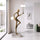 antique gold juggler sculptural floor lamp with orb lights