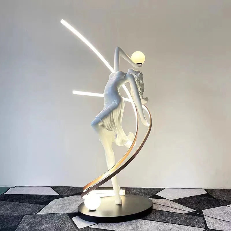 Liberty Sculpture Floor Lamp Standard Edition – silver and white human-form lamp with LED arcs and glowing orb.”