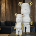 Pearl white bear sculptures with gold metallic accents set of two