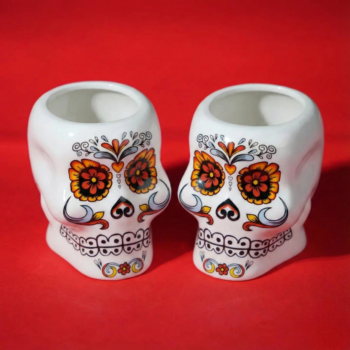 Skull shaped cocktail mugs with floral pattern design, novelty drinkware for cocktails and tequila, colorful barware for home bar and parties