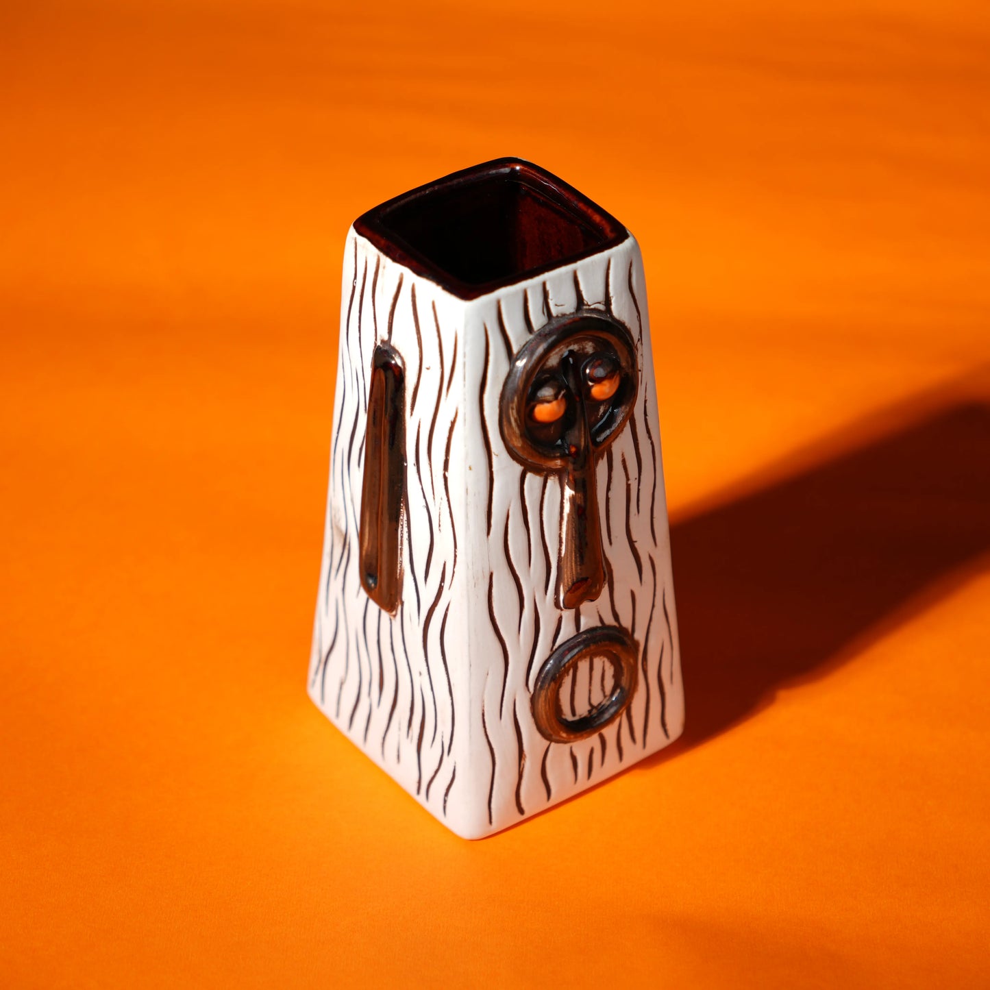 ceramic totem tiki mug with carved tribal face