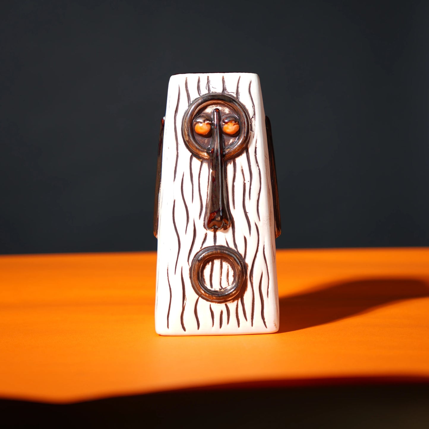 ceramic totem tiki mug with carved tribal face