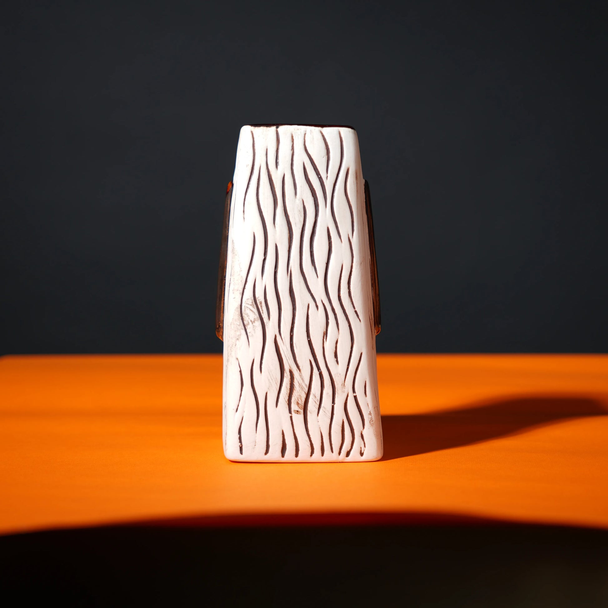 ceramic totem tiki mug with carved tribal face