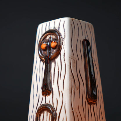 ceramic totem tiki mug with carved tribal face