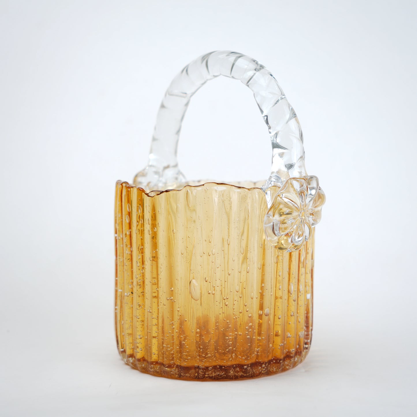 Amber ribbed glass basket with clear handle decorative design