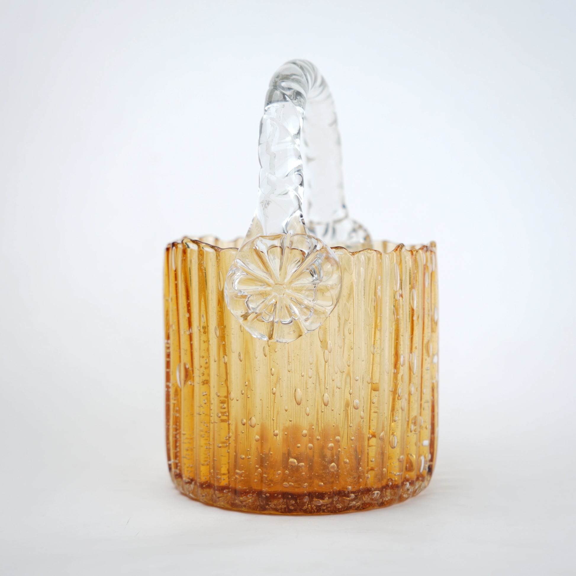 Amber ribbed glass basket with clear handle decorative design