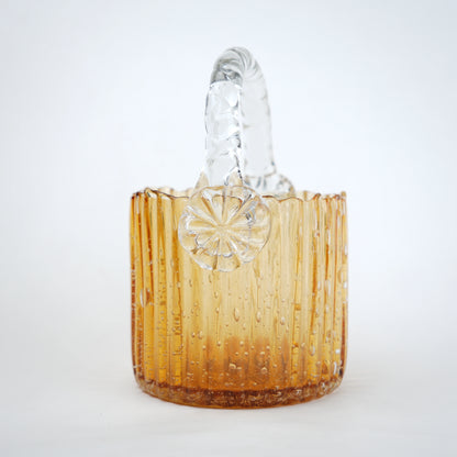 Amber ribbed glass basket with clear handle decorative design