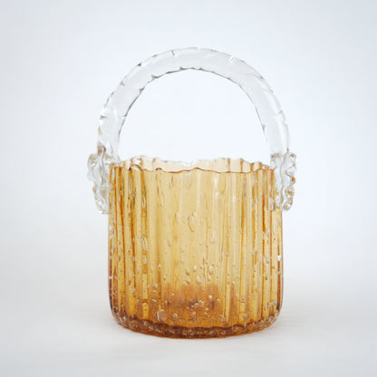 Amber ribbed glass basket with clear handle decorative design