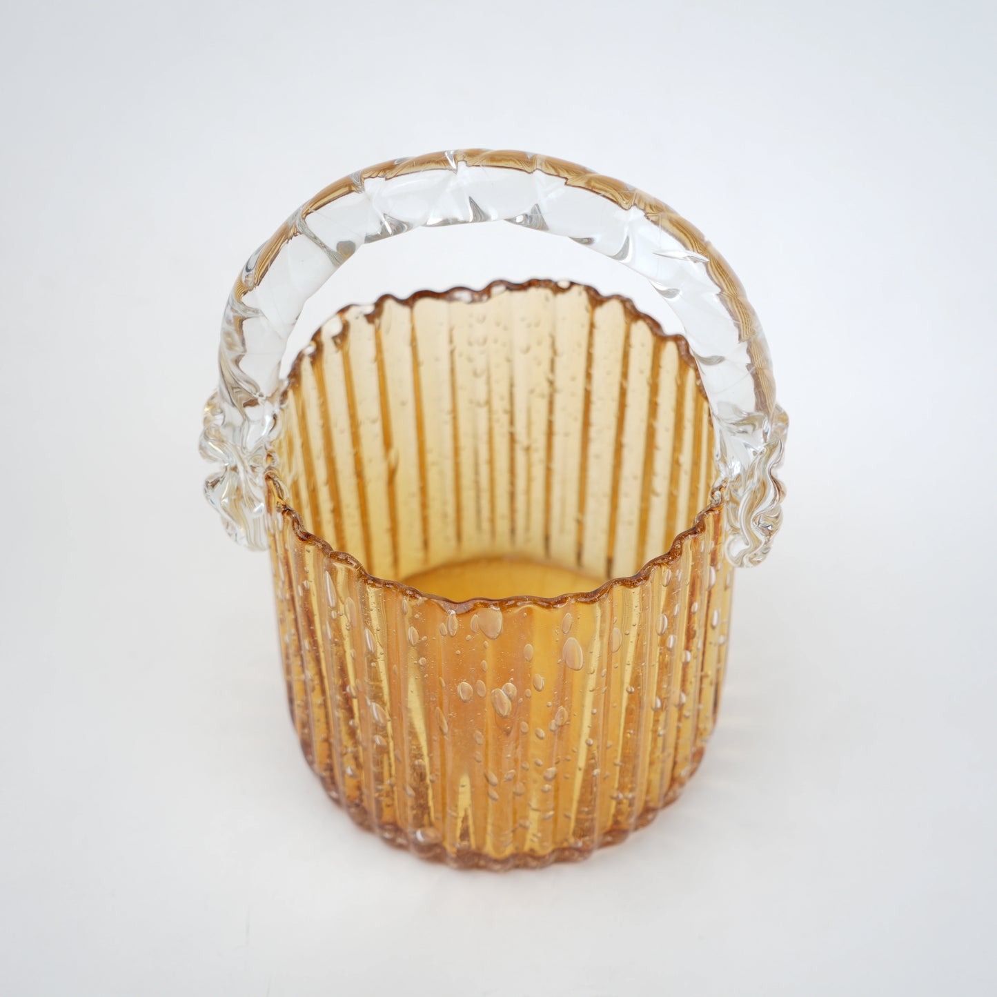 Amber ribbed glass basket with clear handle decorative design