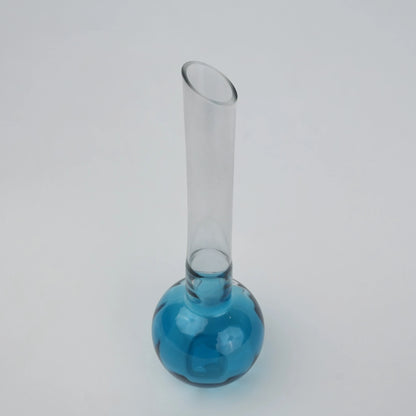 Glass vase with spherical base and elongated cylindrical neck designed for single stem floral arrangements