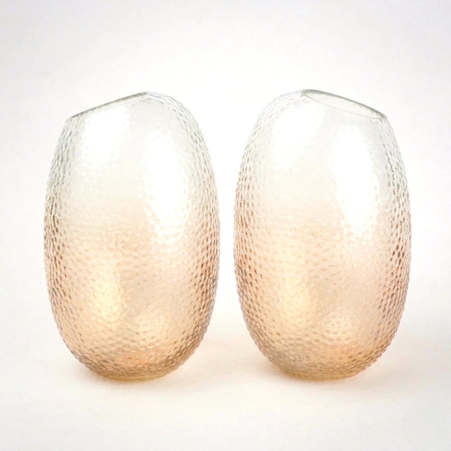 Pebble texture oval glass decorative vase with rounded base and textured surface