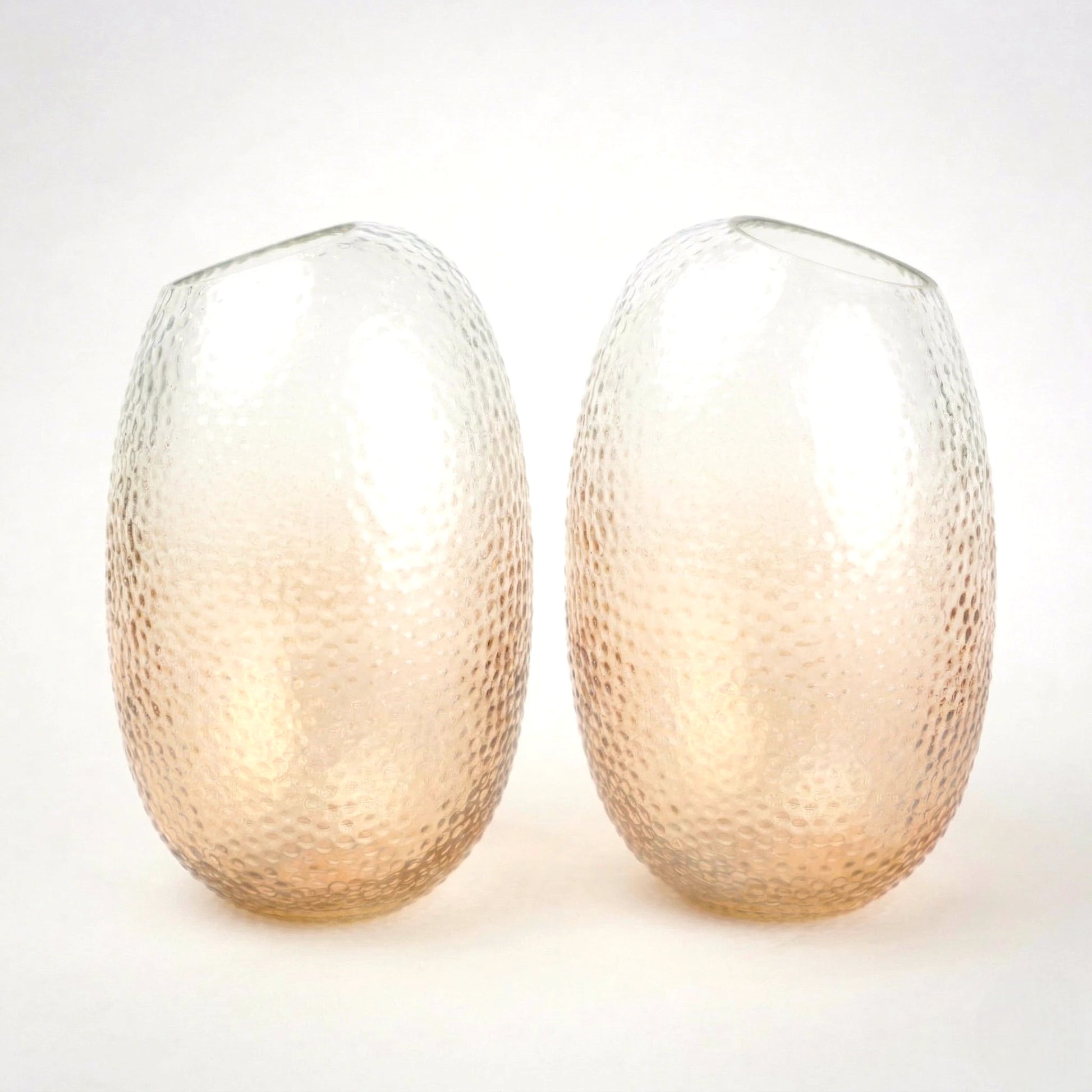 Pebble texture oval glass decorative vase with rounded base and textured surface