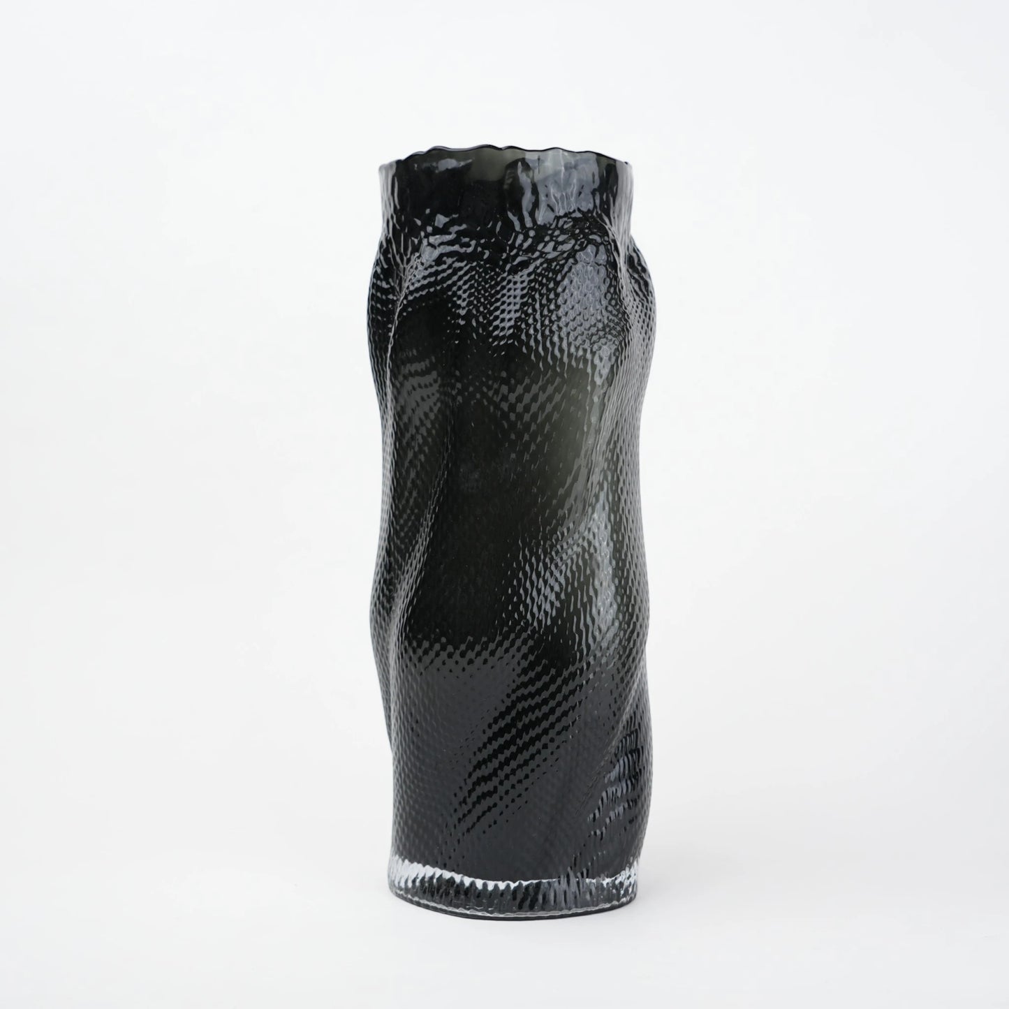 Textured art glass vase with flowing sculptural form and dimensional surface detailing