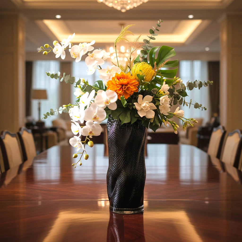 Black flow vase ballroom centerpiece arrangement