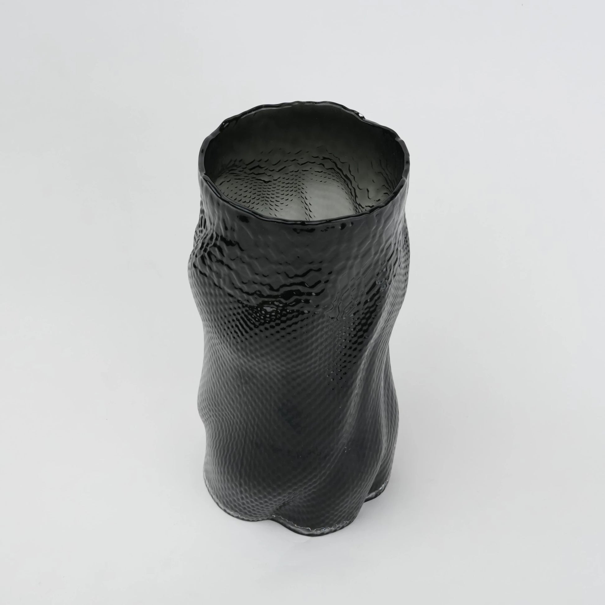 Matte black flow vase elevated angle interior