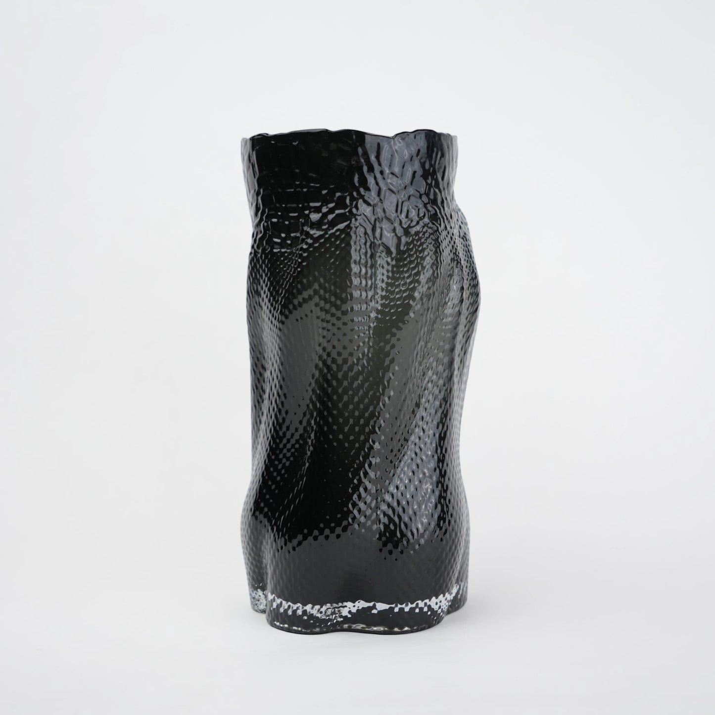 Textured art glass vase with flowing sculptural form and dimensional surface detailing