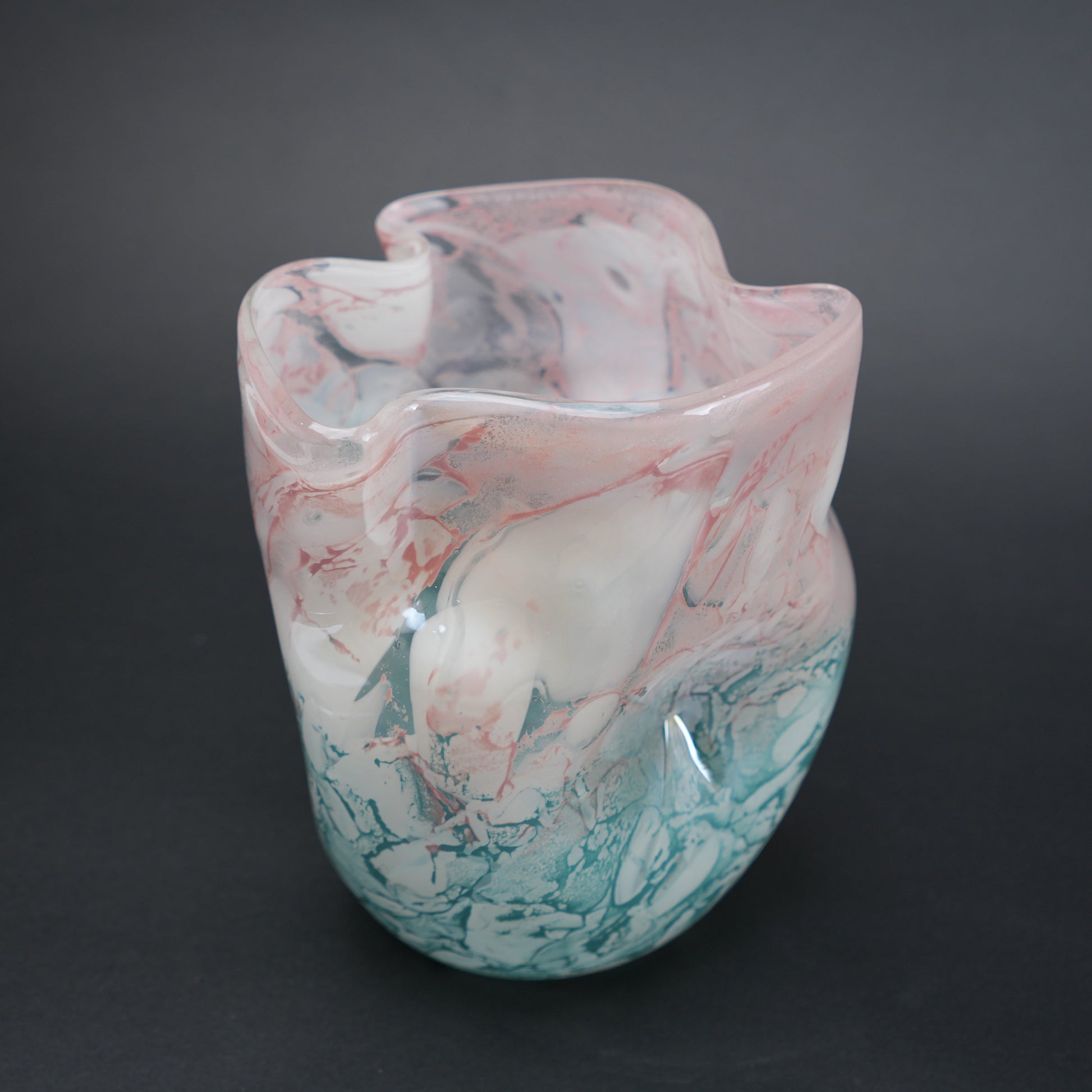 Frosted white glass vase with aqua gradient base and soft blush marble veining.