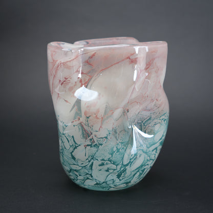 Frosted white glass vase with aqua gradient base and soft blush marble veining.