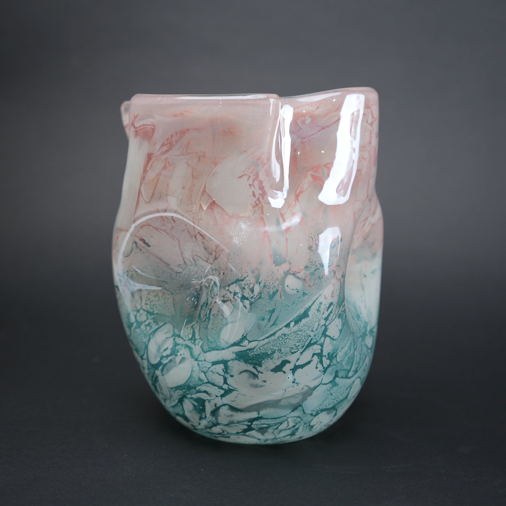 Frosted white glass vase with aqua gradient base and soft blush marble veining.