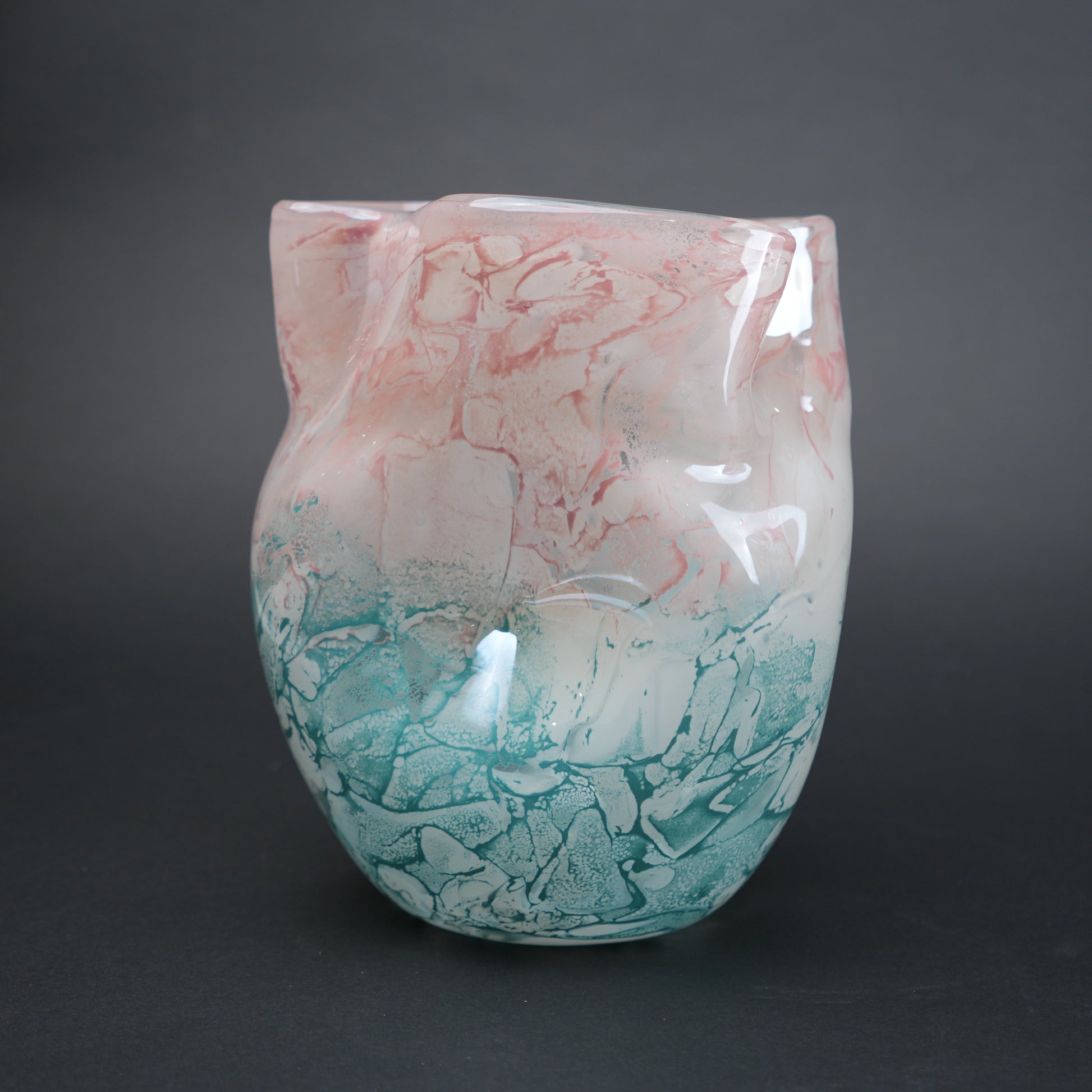 Frosted white glass vase with aqua gradient base and soft blush marble veining.