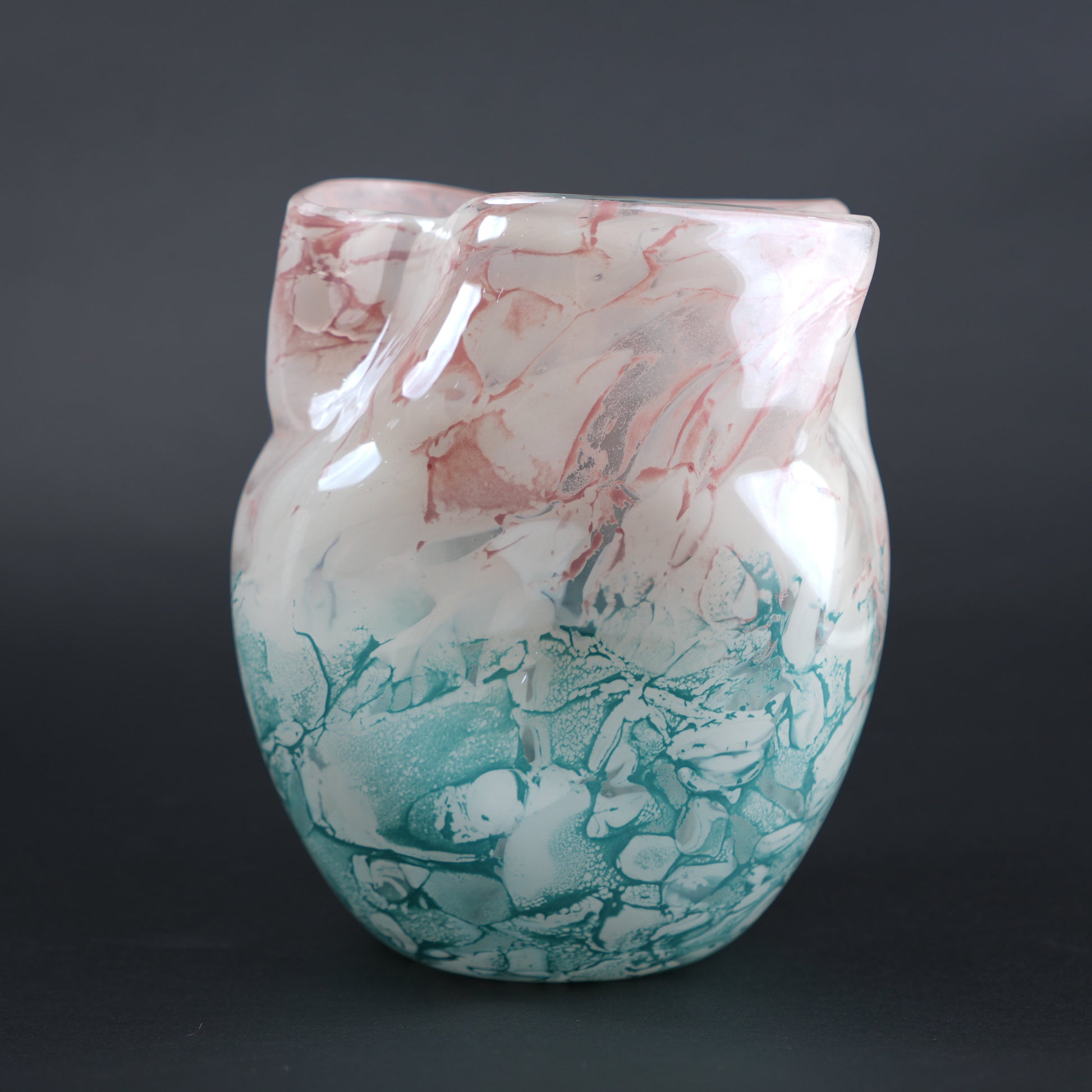 Frosted white glass vase with aqua gradient base and soft blush marble veining.